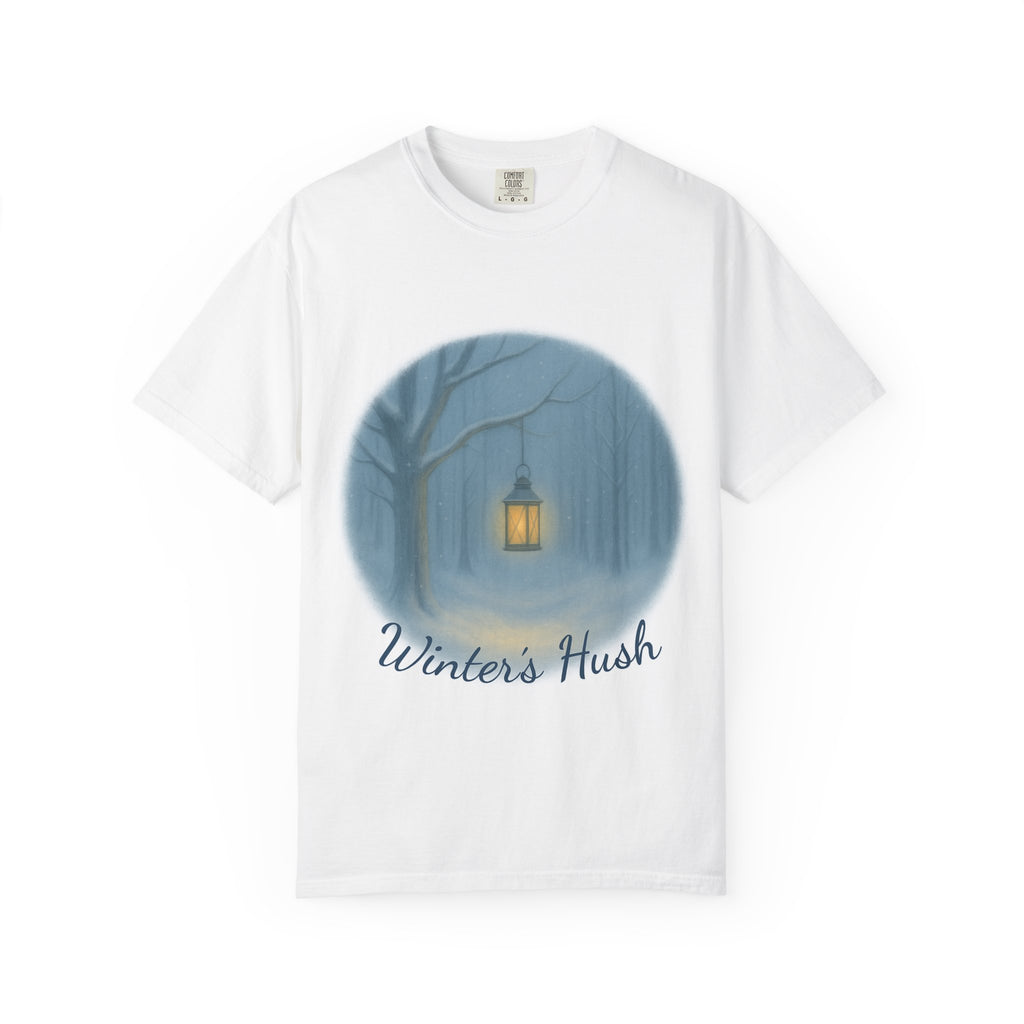 White t-shirt with a graphic of a lantern in a snowy forest and 'Winter's Hush' text on a white background