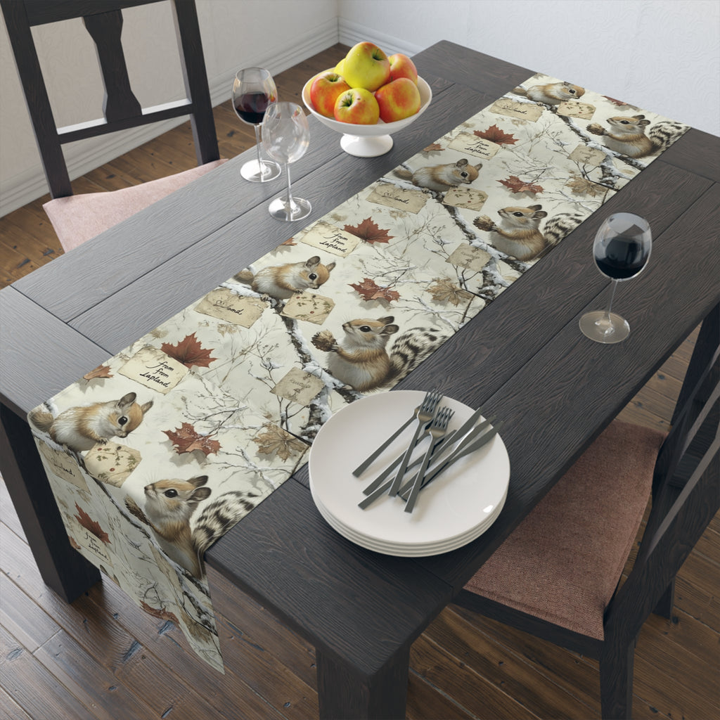 Dining table runner with a squirrel-themed images.